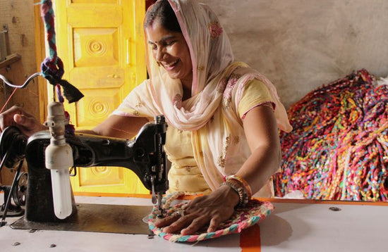 female artisan sewing chindi product