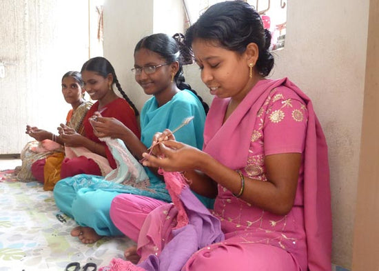 female artisans crocheting