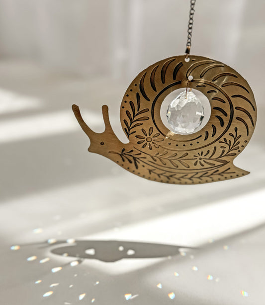 Surya Snail Engraved Brass Suncatcher