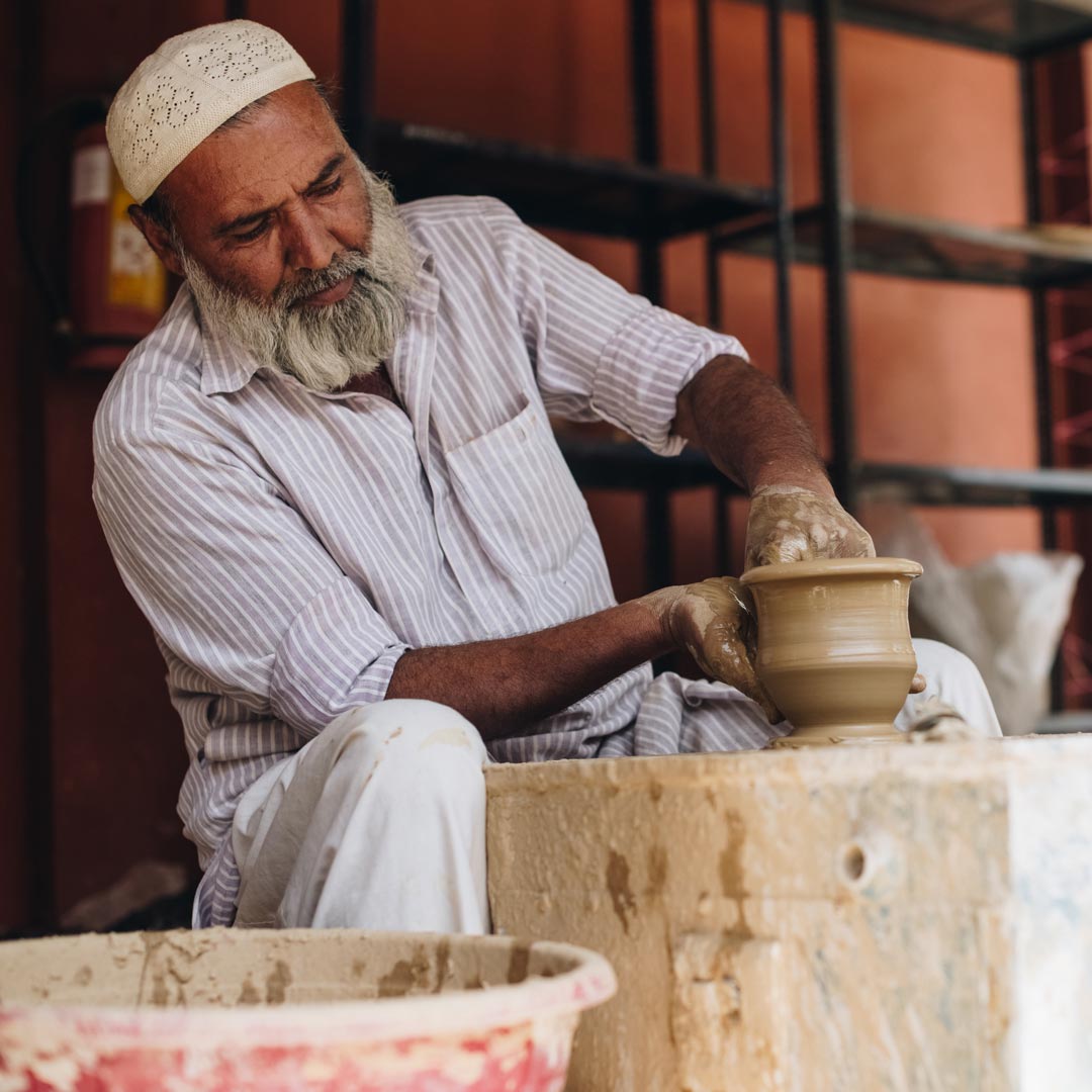 artisan creating pottery